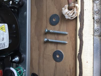 Screws used to attach the metal bar under the fridge to board + plywood.